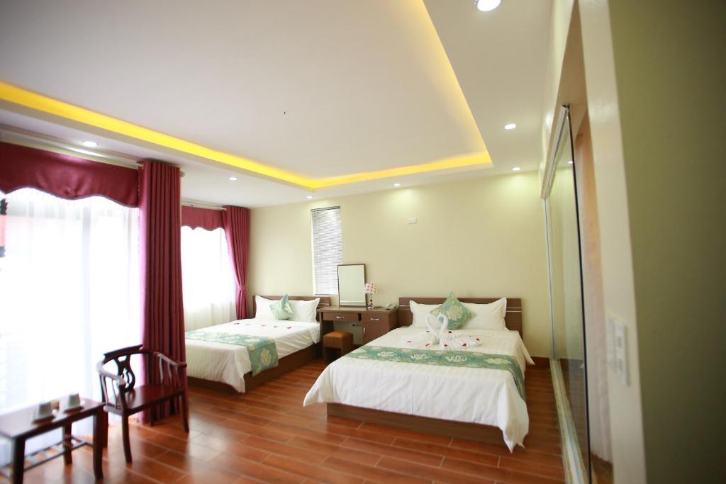 Четырехместный (Номер Делюкс с 2 кроватями размера «queen-size»), Family Hotel Soc Son