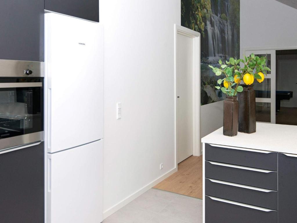 10 person holiday home in R m photo 4