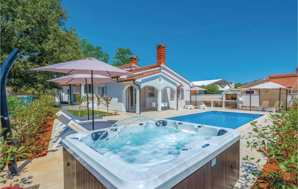 Awesome Home In Vabriga With 4 Bedrooms, Jacuzzi And Outdoor Swimming Pool