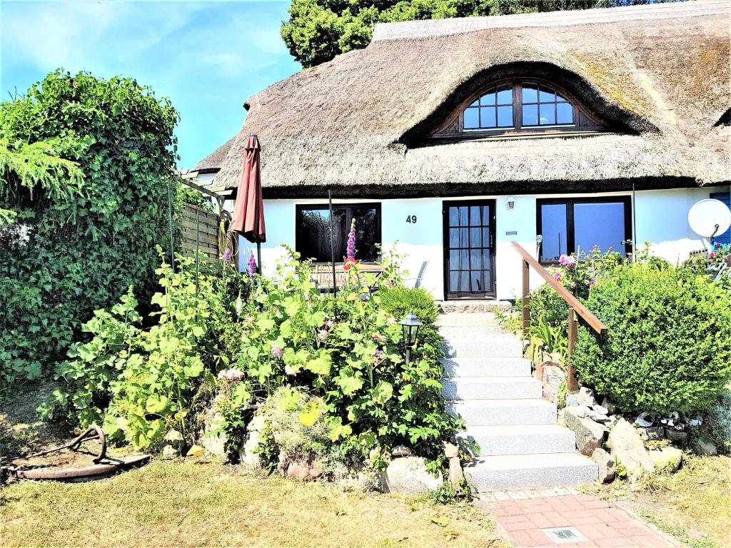 Ferienhaus mit Reetdach und Seebli photo 1