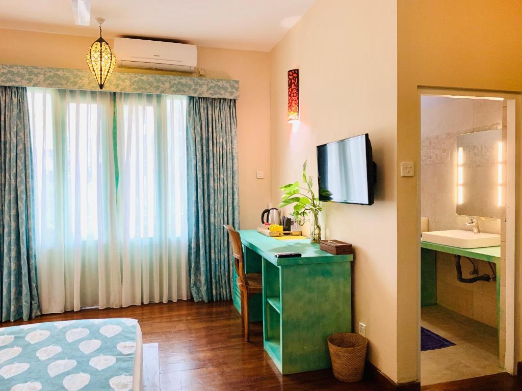 Трехместный (Двухместный номер Делюкс с 1 кроватью), Thaproban Beach House
