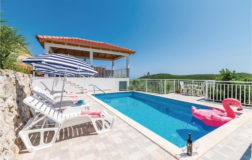 Amazing Home In Babino Polje With 3 Bedrooms, Wifi And Outdoor Swimming Pool