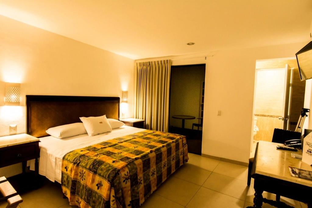 Hotel María Jose - Tap to explore photos