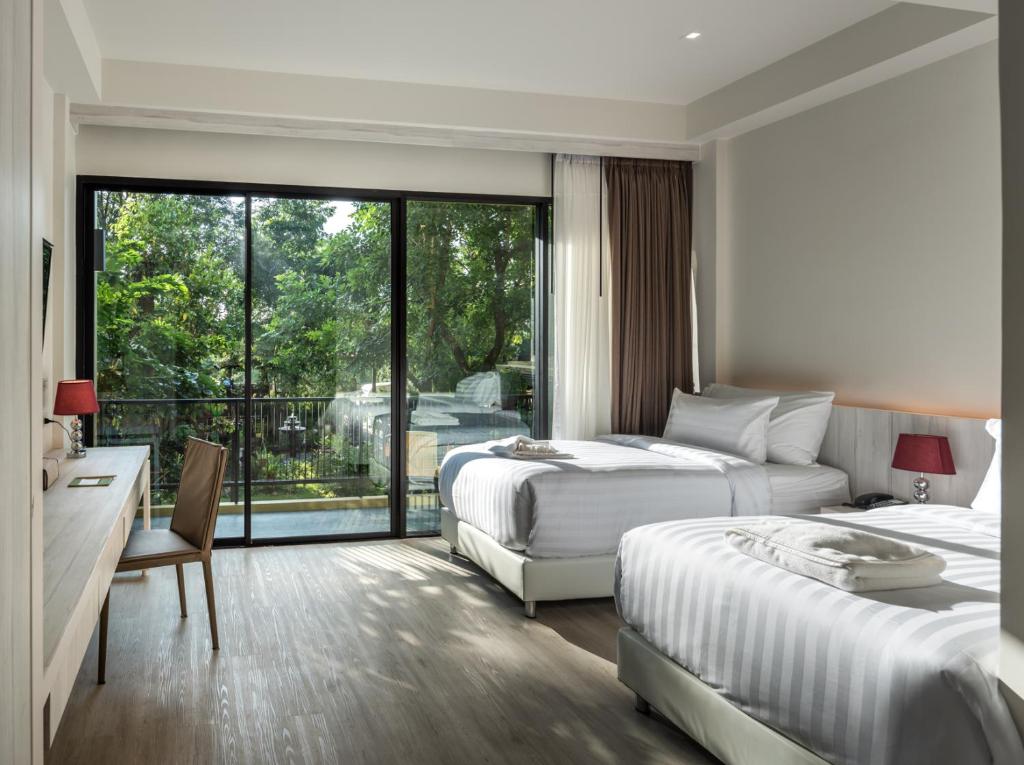 T-Rex Buriram Boutique Hotel - Tap to explore photos
