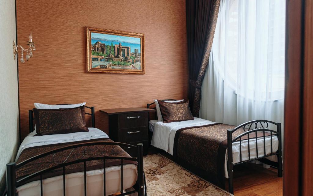 Двухместный (Просторный двухместный номер с 2 отдельными кроватями), Отель Bayil