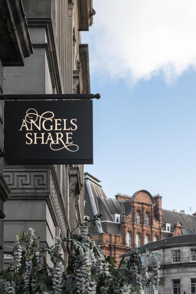 Angel's Share Hotel - Tap to explore photos