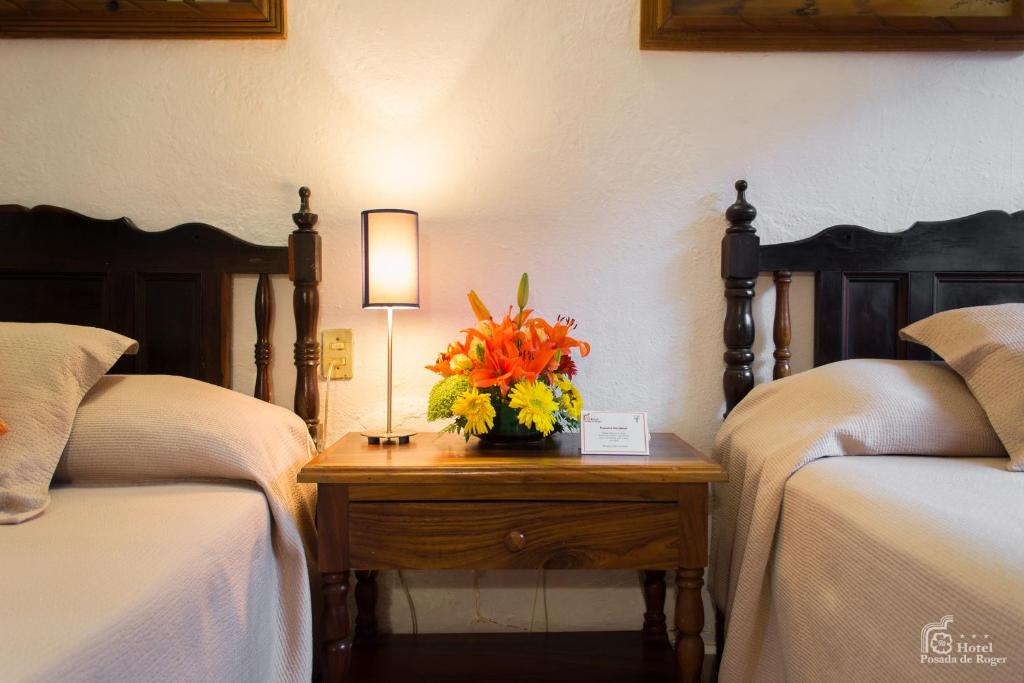 Четырехместный (Двухместный номер с 2 двуспальными кроватями), Hotel Posada De Roger