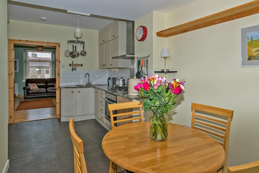 Cosy Cottage Close to East Beach, Shops, Restaurants and RAF base photo 1