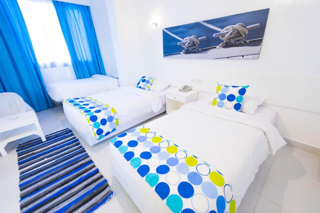 Трехместный (Улучшенный трехместный номер с видом на море), El Jawhara Lodge & Beach