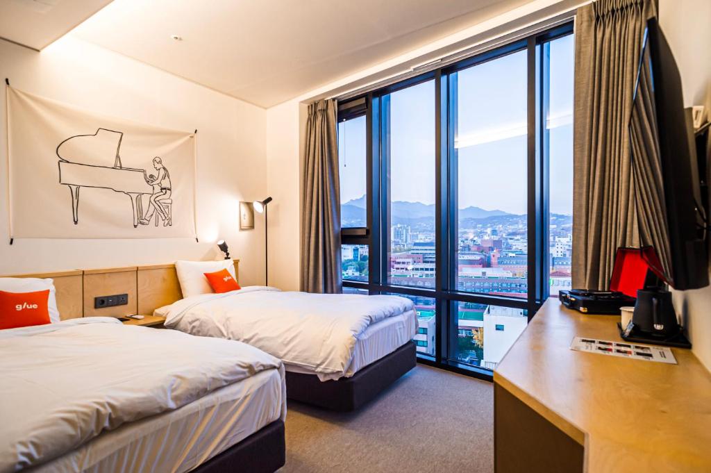 Двухместный (Двухместный номер Делюкс с 2 отдельными кроватями), Glue Hotel
