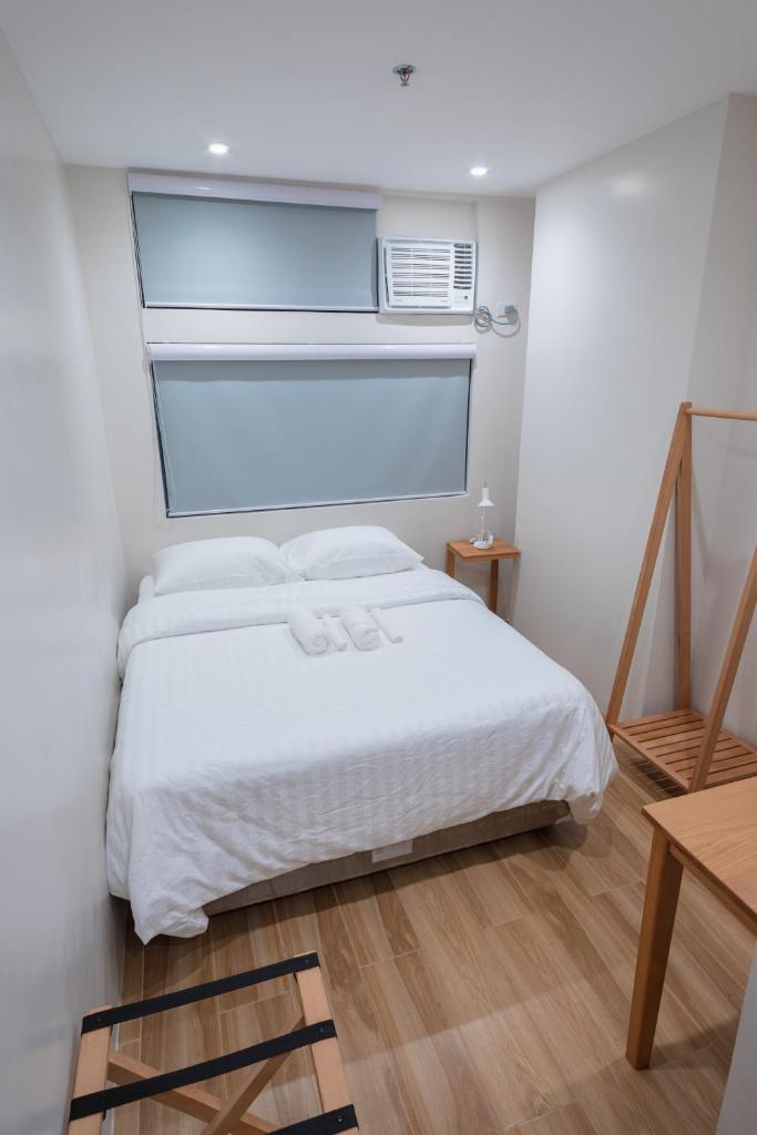 Двухместный (Улучшенный номер с кроватью размера «queen-size»), Arceli's Place - BGC Access