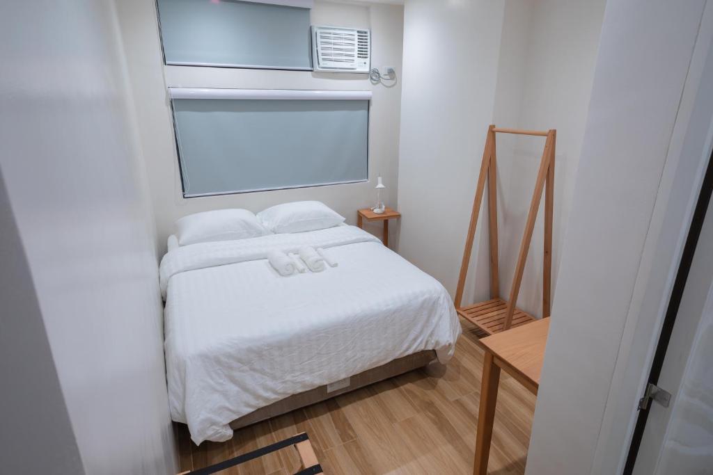 Двухместный (Улучшенный номер с кроватью размера «queen-size»), Arceli's Place - BGC Access