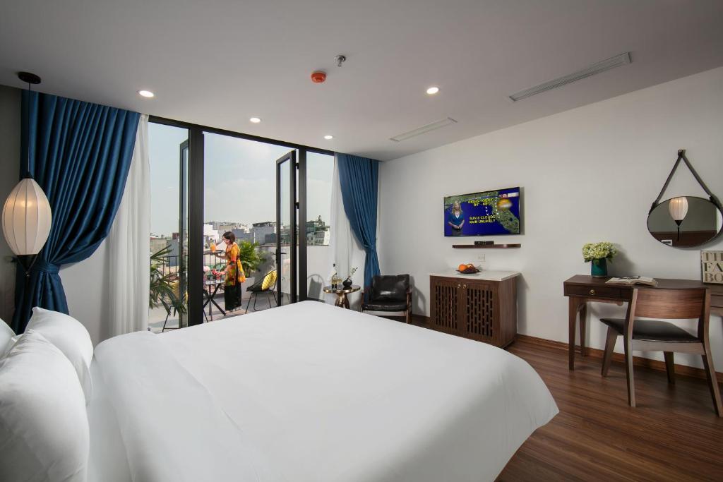 Hanoi Exclusive Hotel - Tap to explore photos