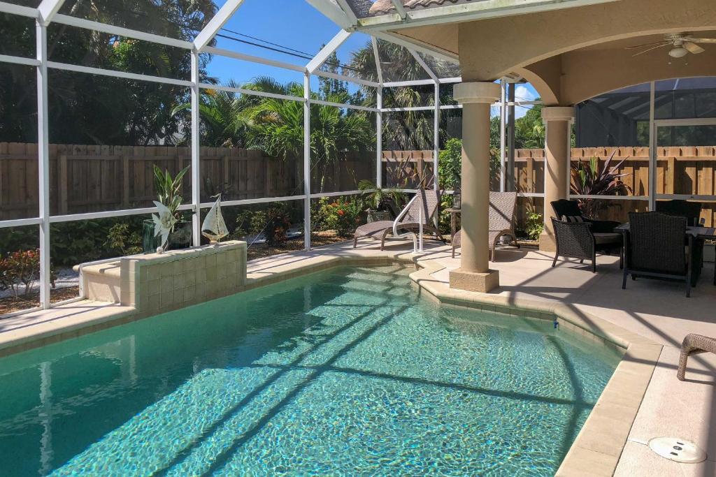 Superb Naples Home with Den and Private Saltwater Pool photo 1