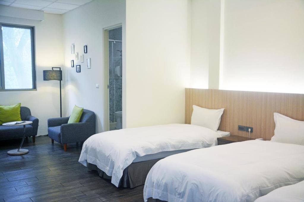 NCNU Campus Inn - Tap to explore photos
