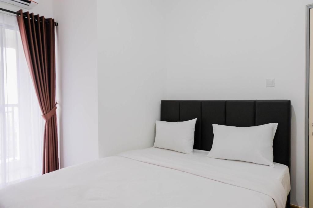 Elegant and Convenient 2BR M-Town Residence Apartment By Travelio, Tangerang