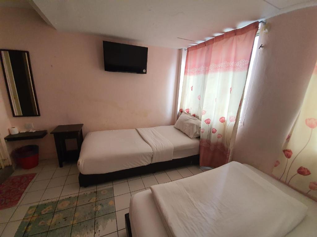 Трехместный (Стандартный трехместный номер), SPOT ON 89698 Budget Inn Hotel