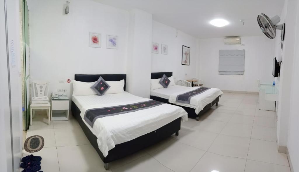 Четырехместный (Улучшенный четырехместный номер), Linh Anh Hotel