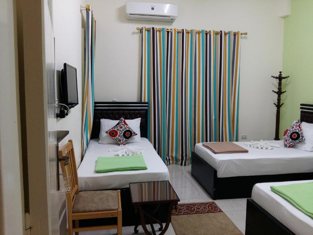 Трехместный (Трехместный номер с собственной ванной комнатой вне номера), Golden Star Hotel