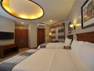 Paragon Hotel and Suites - Tap to explore photos