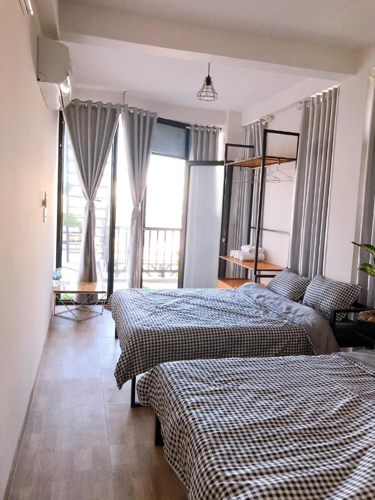 Семейный (Семейный двухместный номер с 1 кроватью), Nắng Homestay with balcony