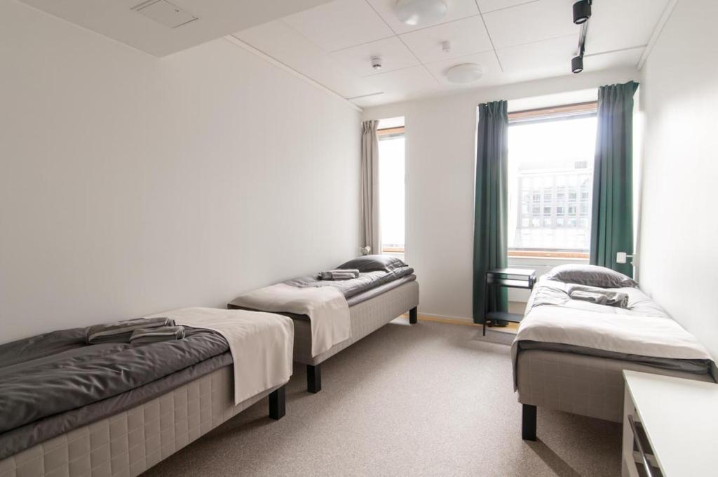 Семейный (Отдельный семейный номер с общей ванной комнатой), Aikatalo Mini Hotel Helsinki City Center