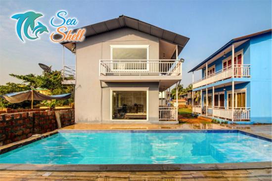 Двухместный (Двухместный номер с 1 кроватью и балконом), Sea Shell Beach Cottages & Suites