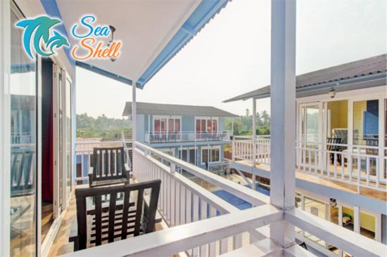 Двухместный (Двухместный номер с 1 кроватью и балконом), Sea Shell Beach Cottages & Suites