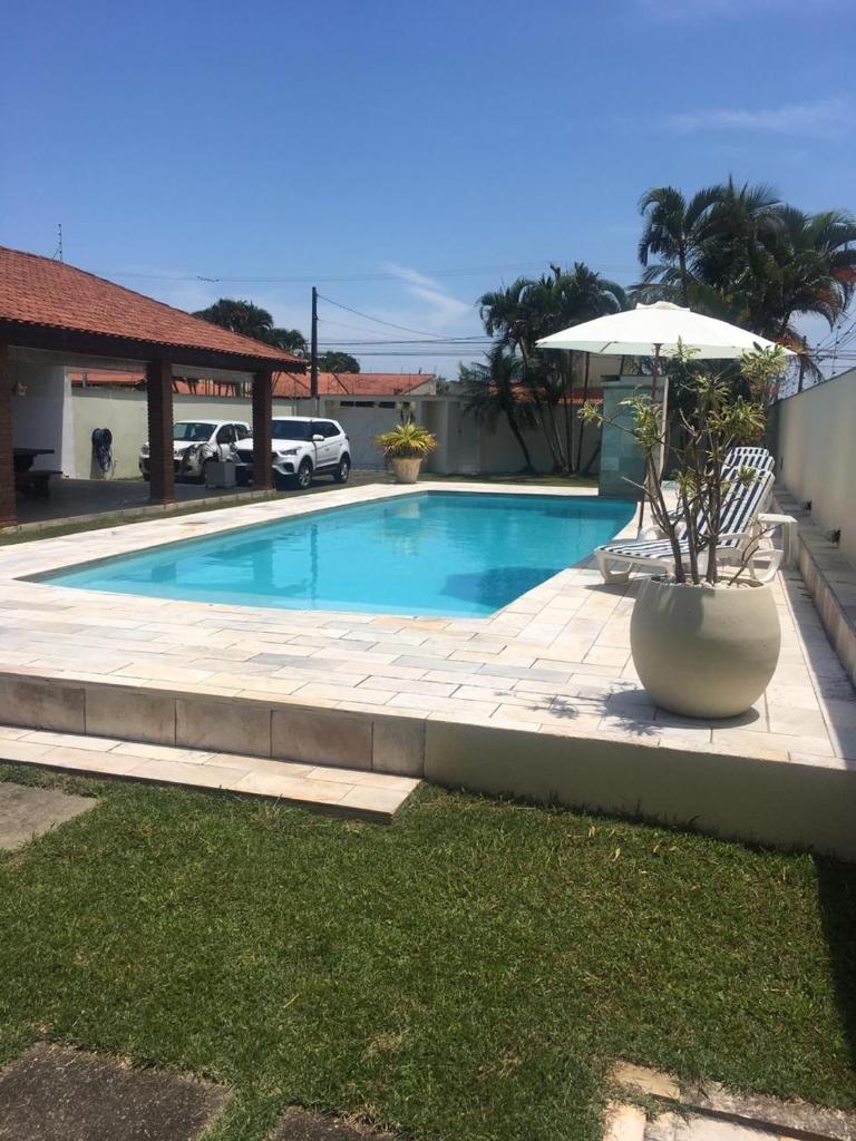 Itanhaém Maravilhosa, Bilhar, Sky, WiFi, Piscina e churrasqueira grande, Gramado, Casa linda de alto padrão a 600m praia photo 3