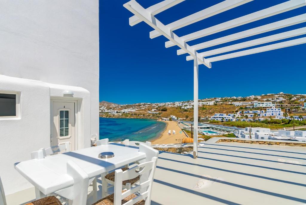 Cape Mykonos - Tap to explore photos