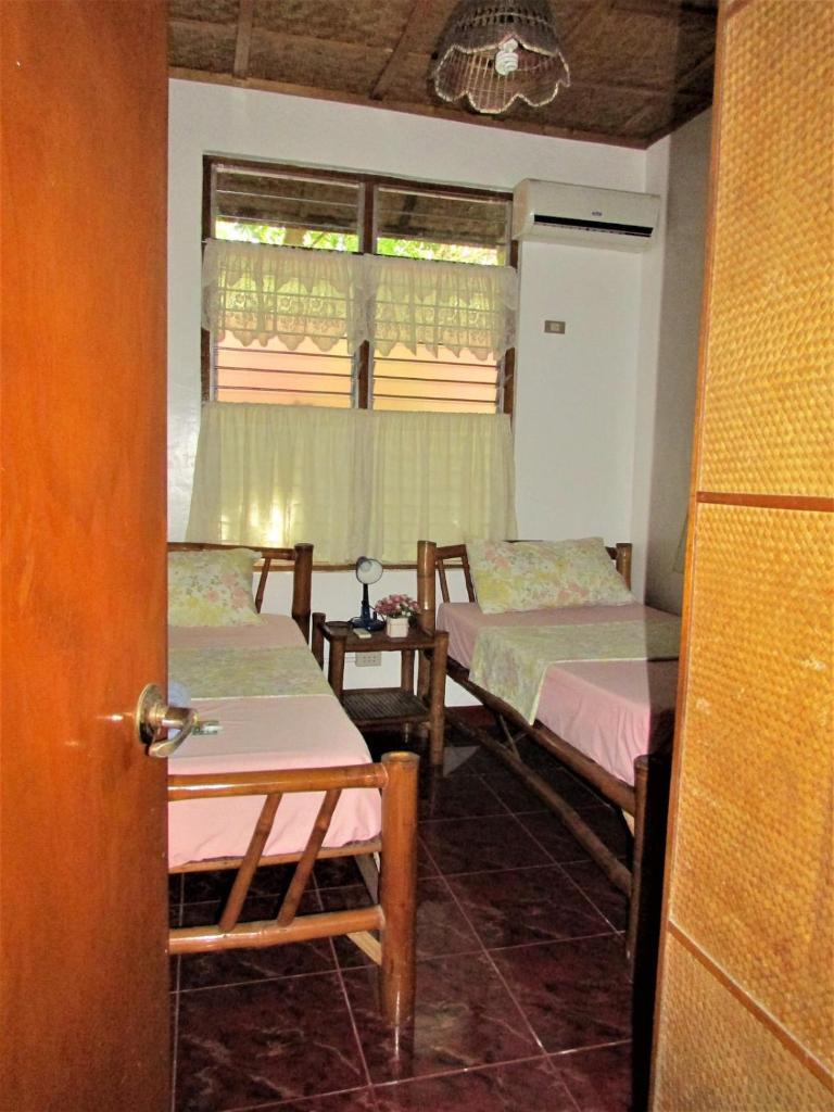 Felipa Beach and Guesthouse - Lotus photo 3