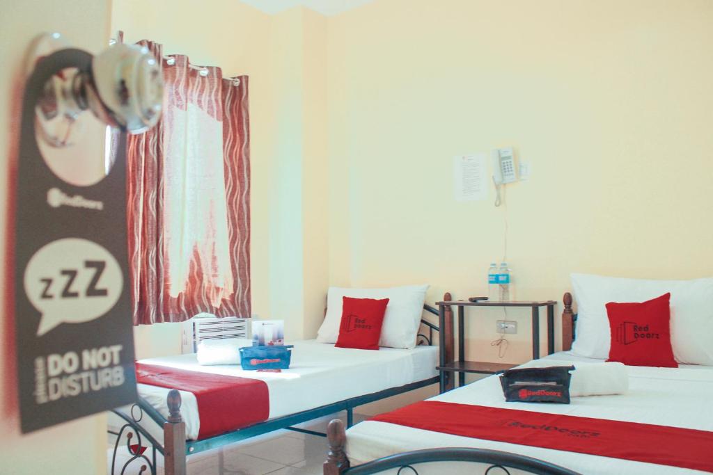Двухместный (Двухместный номер с 2 отдельными кроватями), RedDoorz near Panglao Municipal Hall