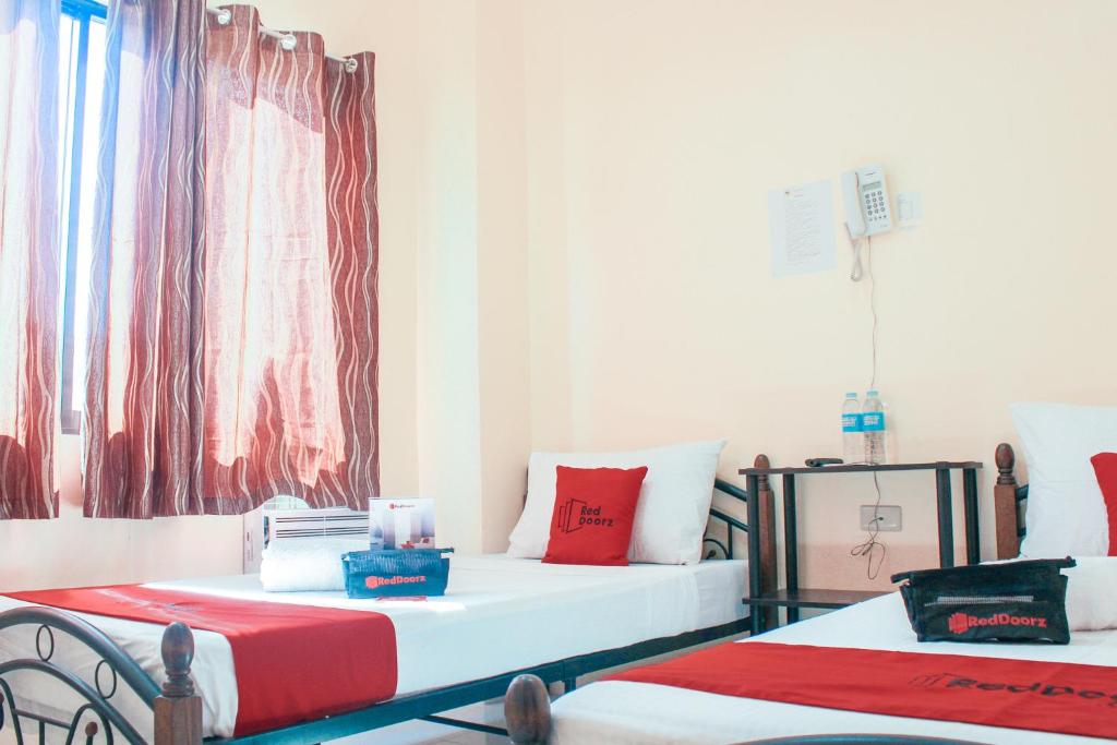 Двухместный (Двухместный номер с 2 отдельными кроватями), RedDoorz near Panglao Municipal Hall