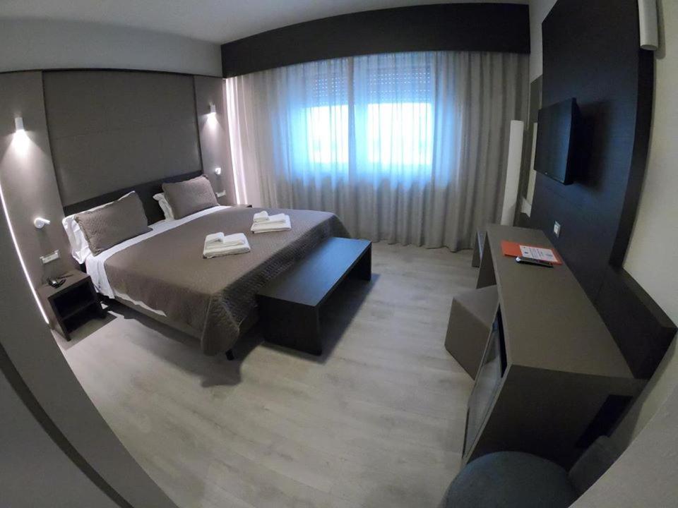 Hotel Santin - Tap to explore photos