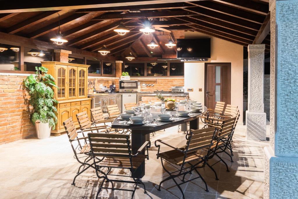Superb villa Maxima with private pool, sauna, jacuzzi, playground for up to 18 persons, extra pool heating available photo 4