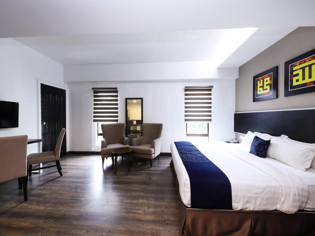 Двухместный (Улучшенный двухместный номер с 1 кроватью), OYO Capital O 978 Midaris Hotel