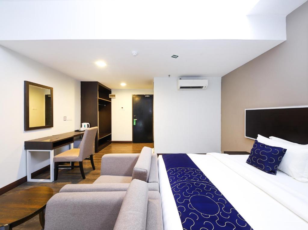 Двухместный (Двухместный номер Делюкс с 1 кроватью), OYO Capital O 978 Midaris Hotel