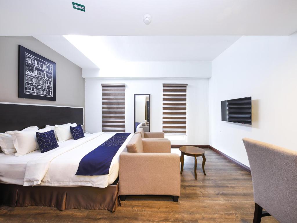 Двухместный (Двухместный номер Делюкс с 1 кроватью), OYO Capital O 978 Midaris Hotel
