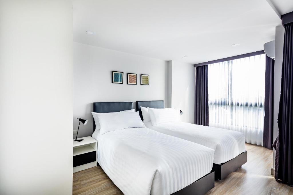 Двухместный (Двухместный номер с 2 отдельными кроватями), The Rizin Hotel & Residences