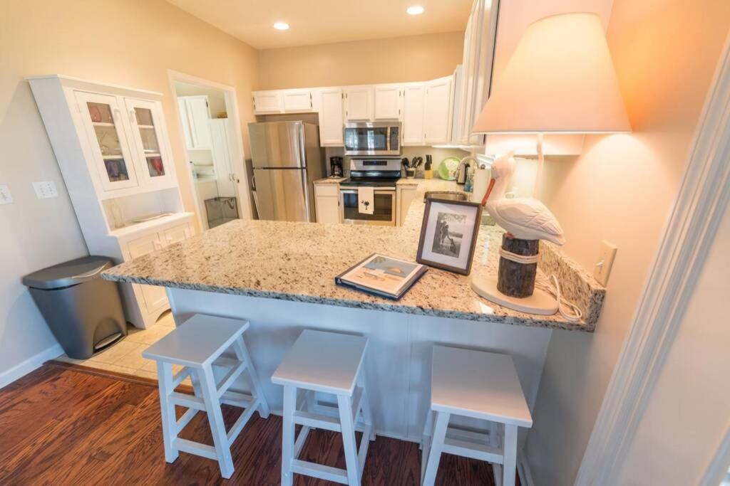 Southern Sunshine! Beach views and steps to the sand, short golf cart ride to the pool. image
