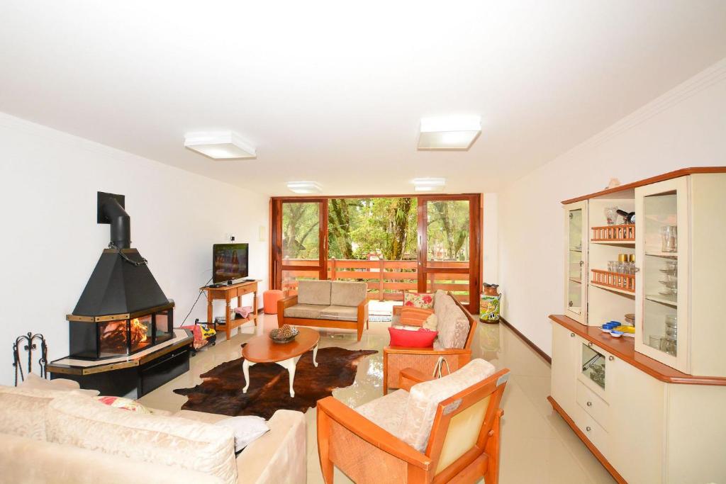 Casa com lareira e área gourmet em Monte Verde photo 2