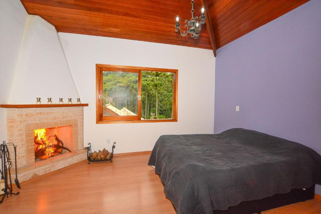 Casa com lareira e área gourmet em Monte Verde photo 4
