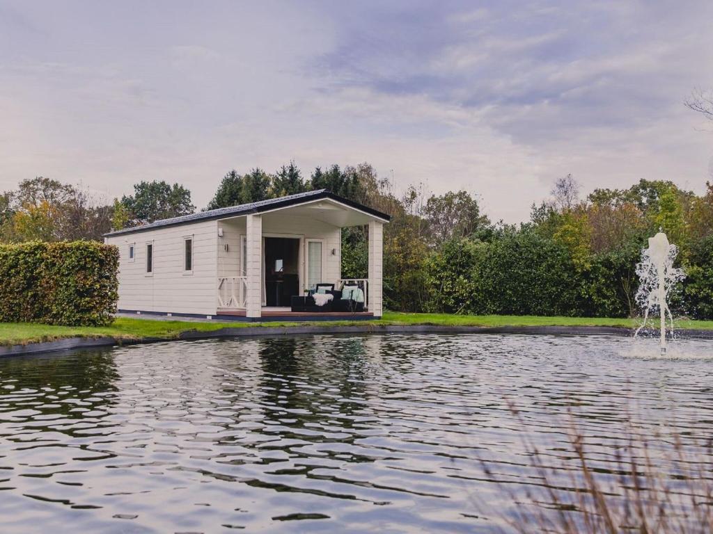 Cozy chalet on a pond, at the edge of the forest