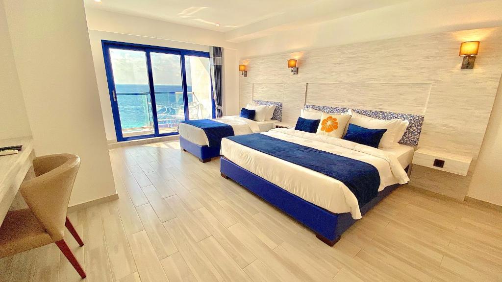 Семейный (Семейный номер Делюкс с балконом, вид на море), Kaani Palm Beach