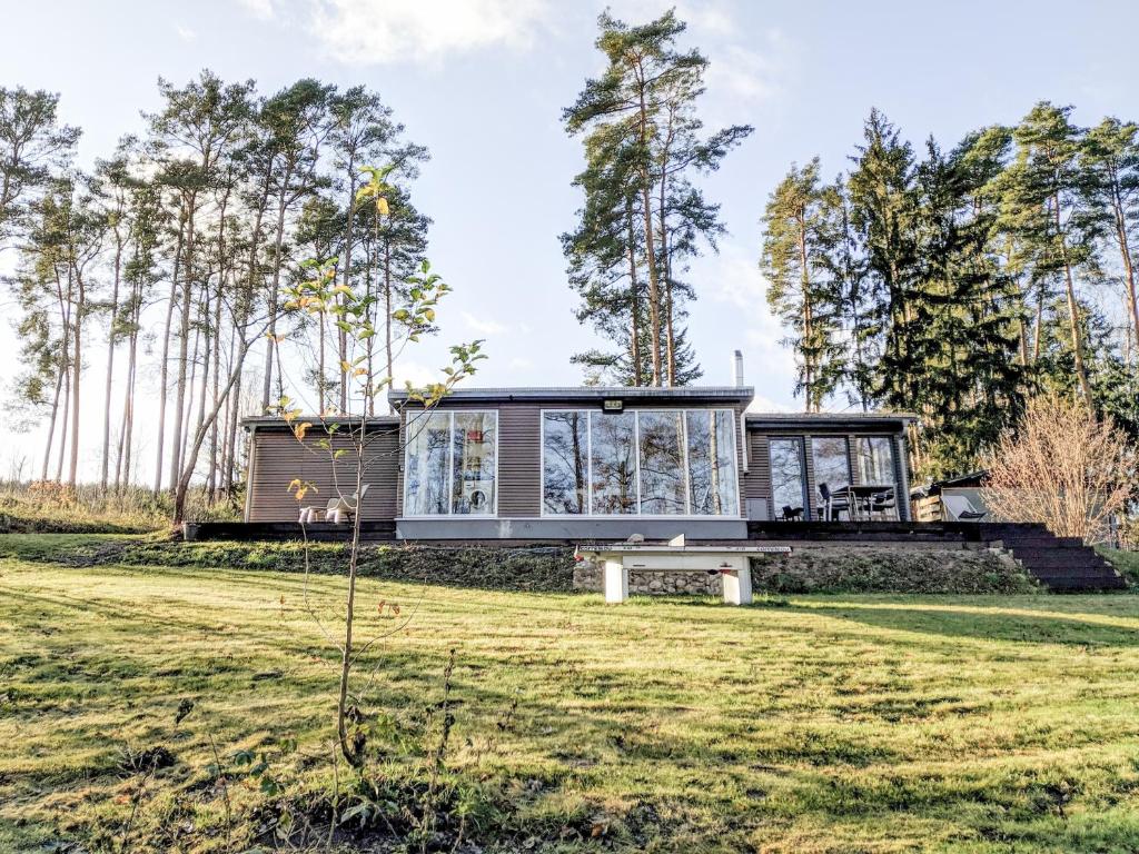 Ferienhaus direkt am See - Kamin, Klima, Sauna und Boot photo 3