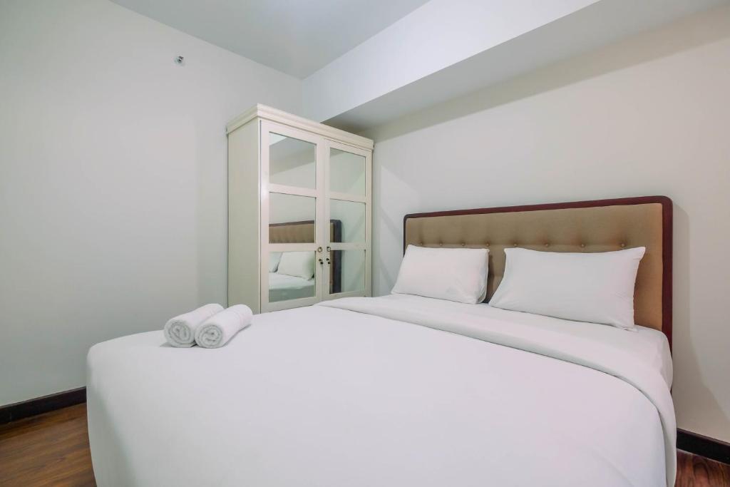 Spacious and Modern 2BR Springlake Summarecon Bekasi Apartment By Travelio photo 2