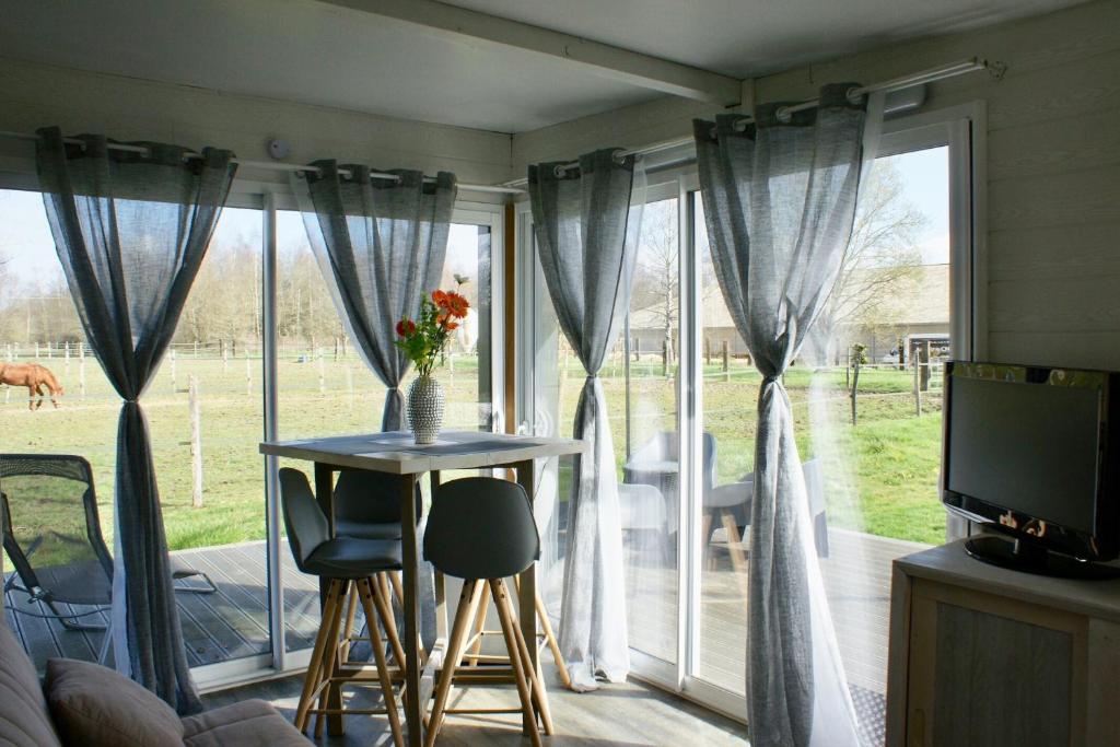 Cottage tout confort au milieu des chevaux photo 3