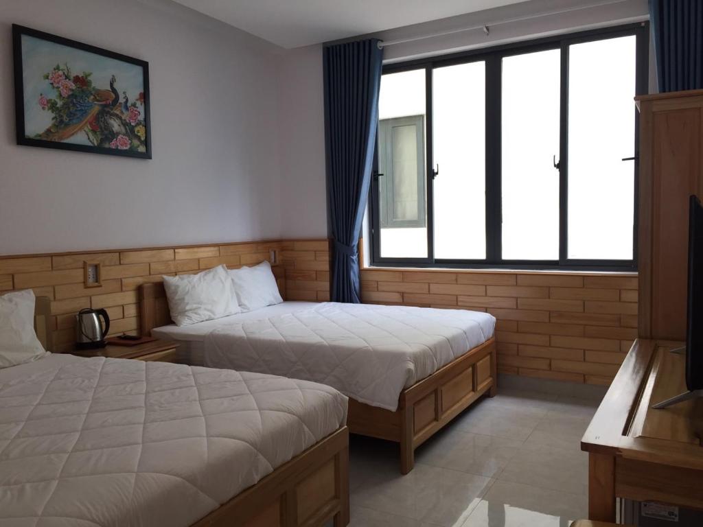 Четырехместный (Номер Делюкс с 2 кроватями размера «queen-size»), Bac Nam My Khe Beach Hotel