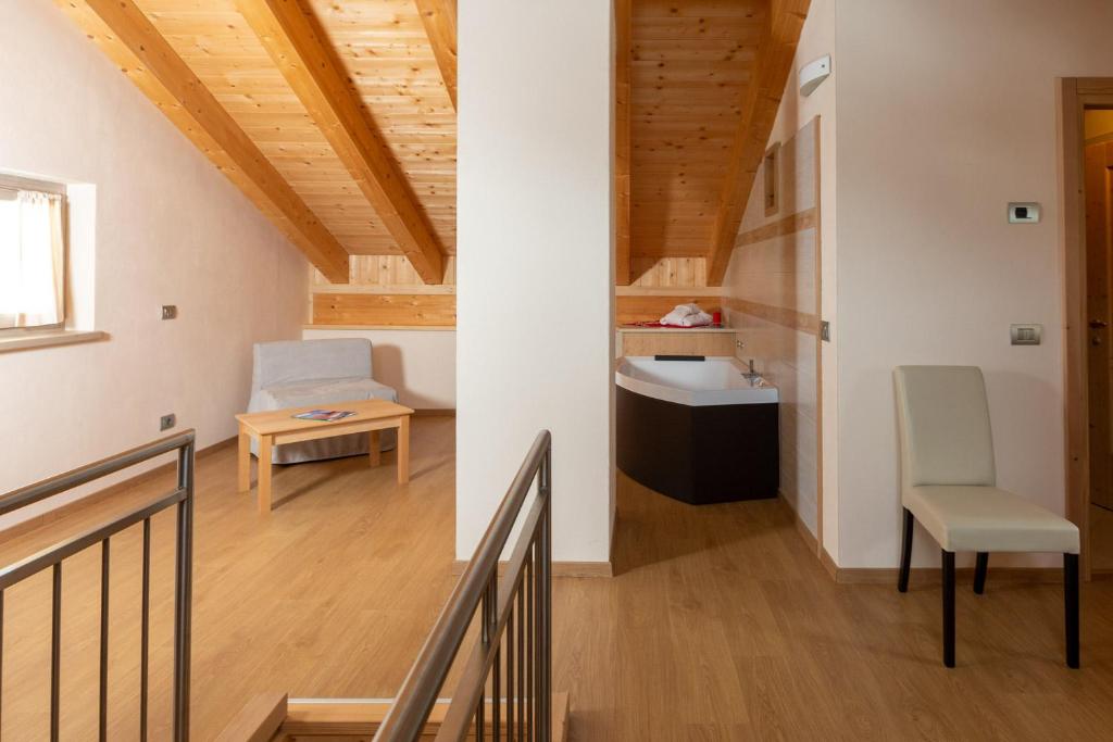 Hotel Meublè Adler - Rooms & Mountain Apartments - Tap to explore photos