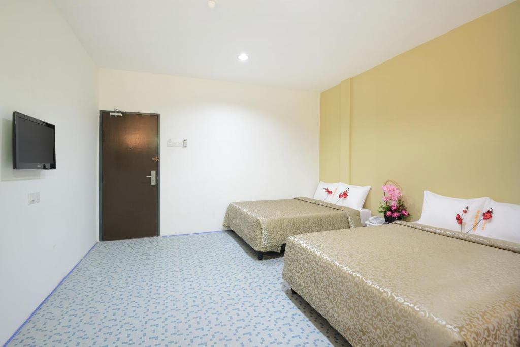 Четырехместный (Стандартный четырехместный номер), Grand Inn - Penang Road